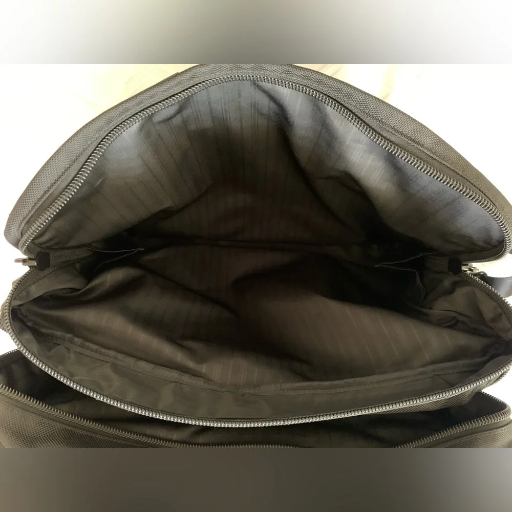 Tumi Black Travel Bag with Adjustable Strap